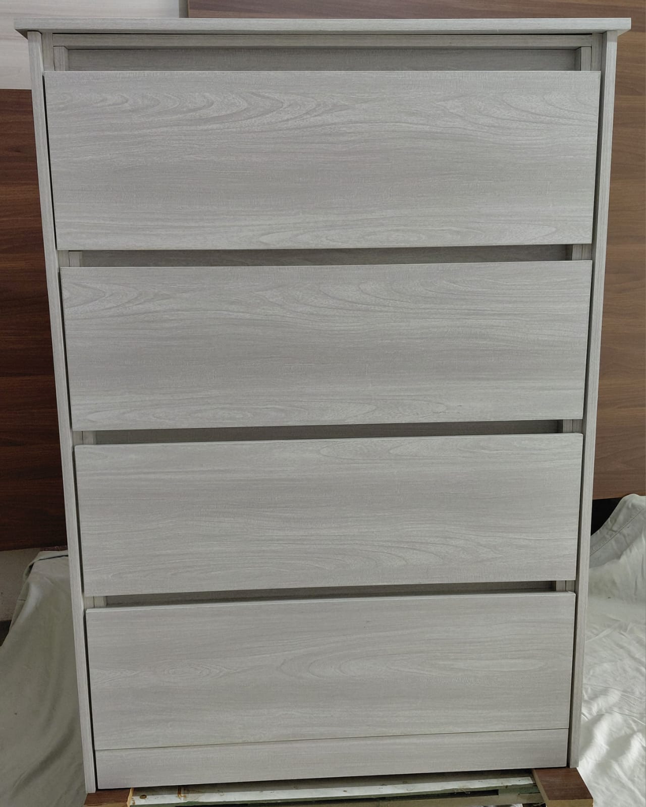 Gray woodgrain four-drawer chest